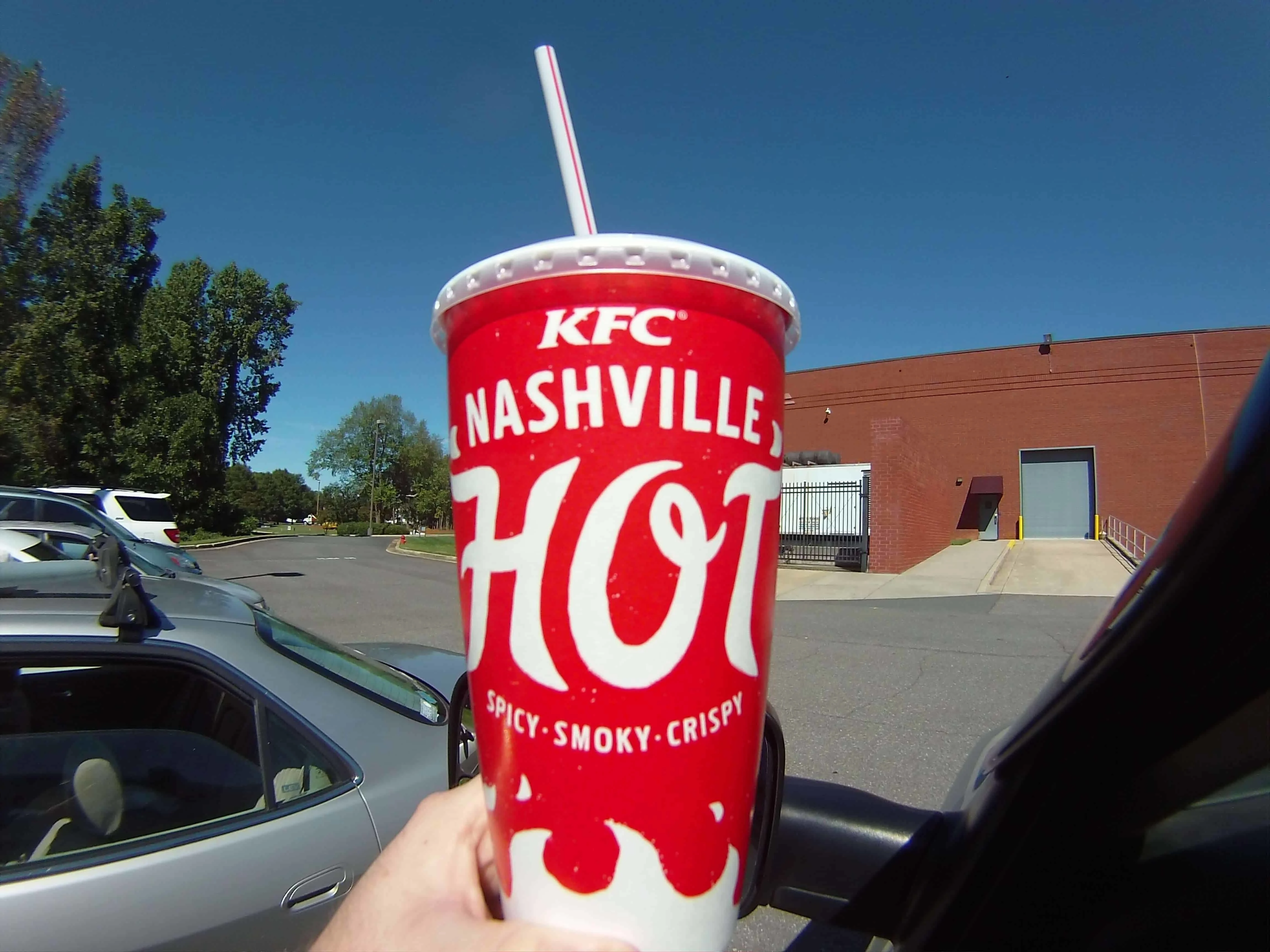 This is a image of a cup from KFC showing advertisment for the Nashville Hot Chicken.