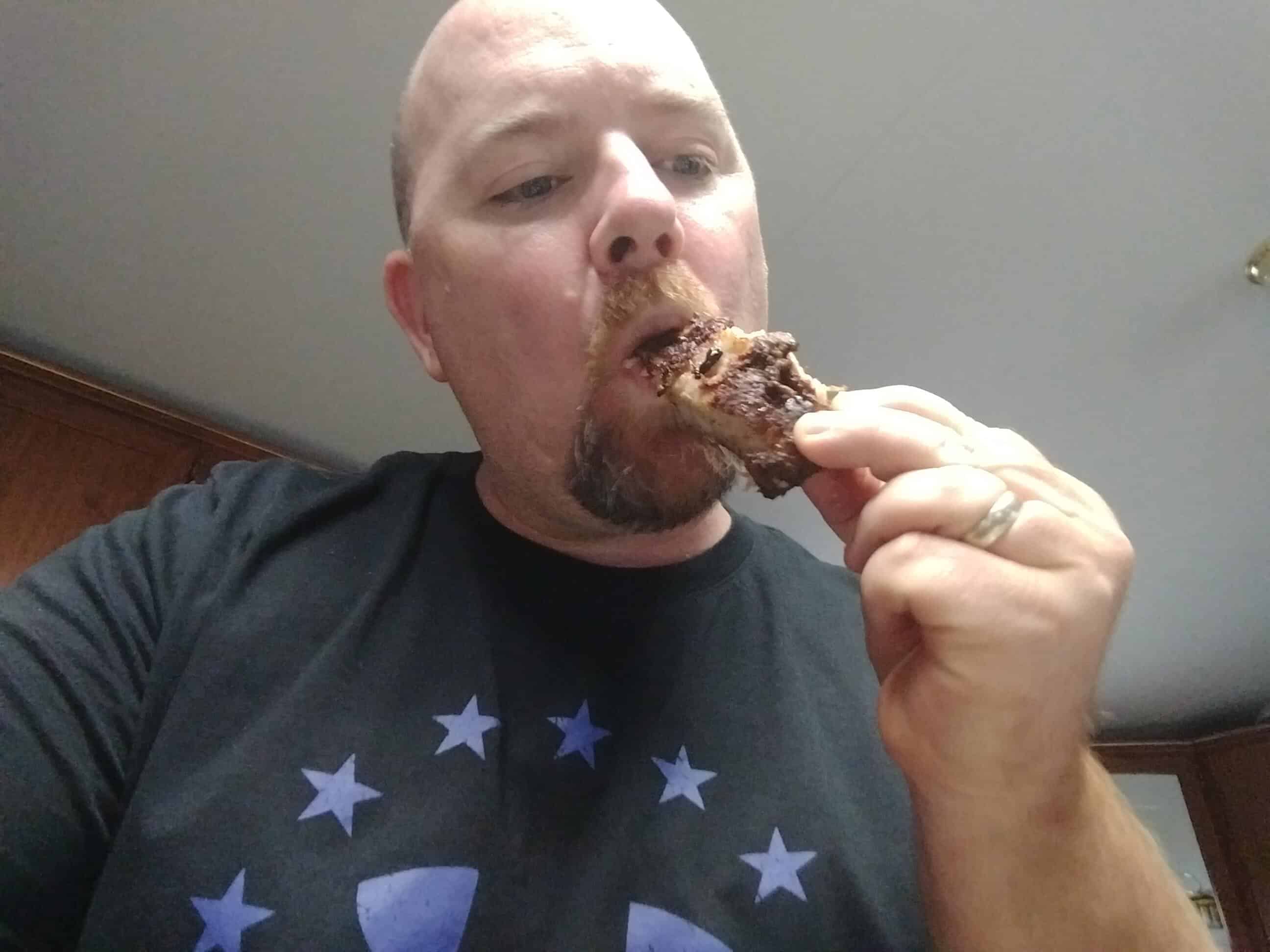 Me eating ribs that was cooked on the orion cooker. 