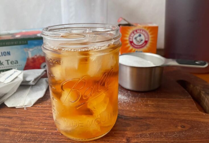 ball wide mouth canning jar full of iced southern sweet tea