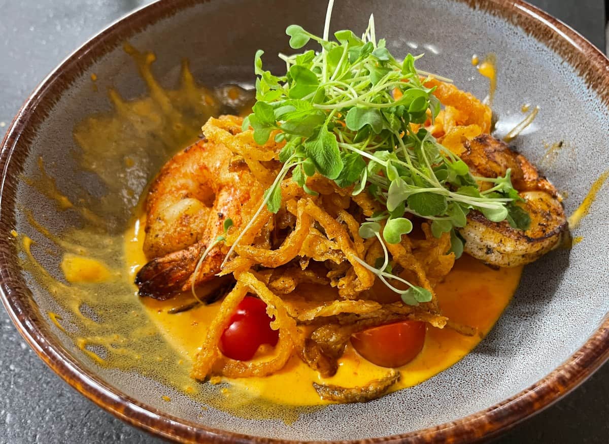 This is a image of a dish called Shrimp and Grits from a restaurant in Travelers Rest, SC called Core 450.
