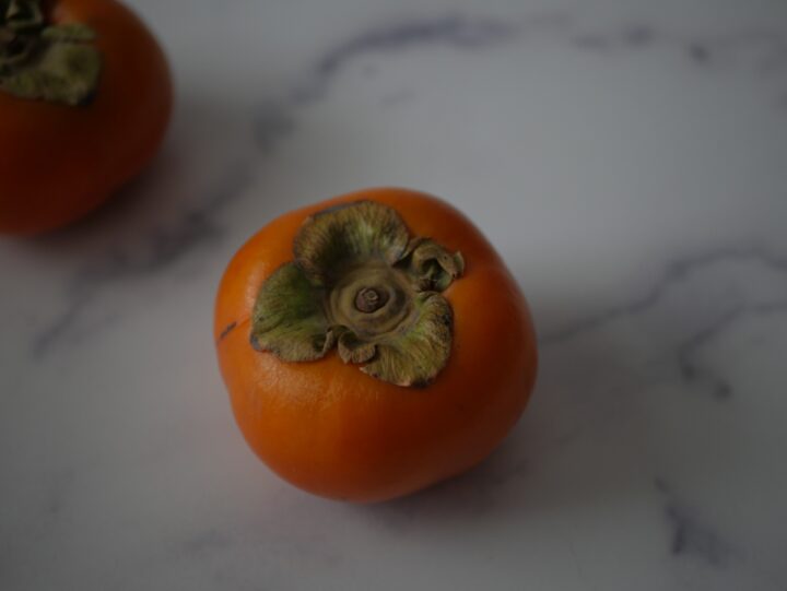 Topview of a Aisian Persimmon called a Fuyu.