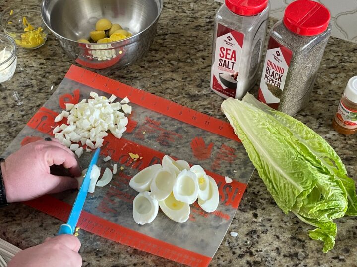 chopping up egg whites.