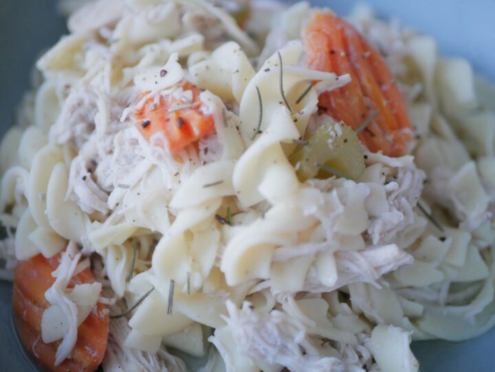 Closeup of chicken noodle soup recipe.