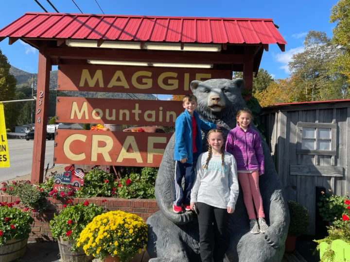 Our Annual fall picture in front on Maggie Mountaineer Crafts. 