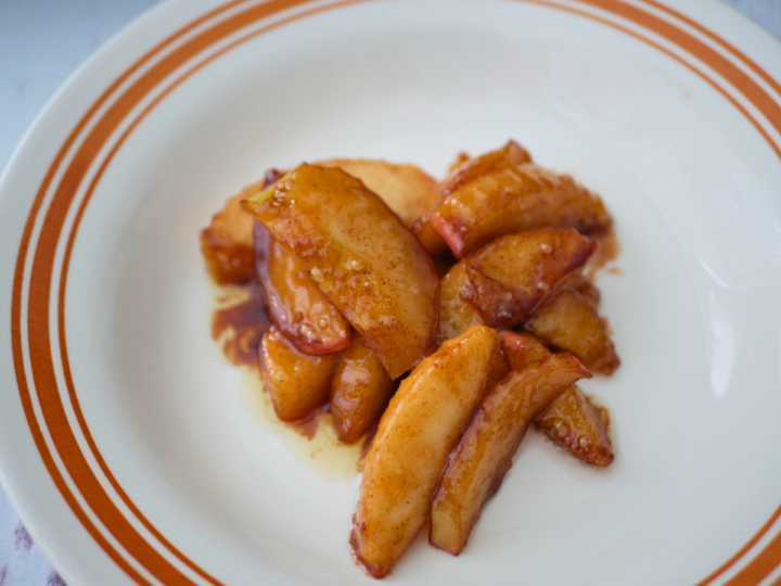 This is a image of fried apples in a bowl.