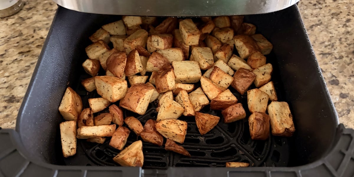 Golden brown crispy red potatoes cooked in an air fryer
