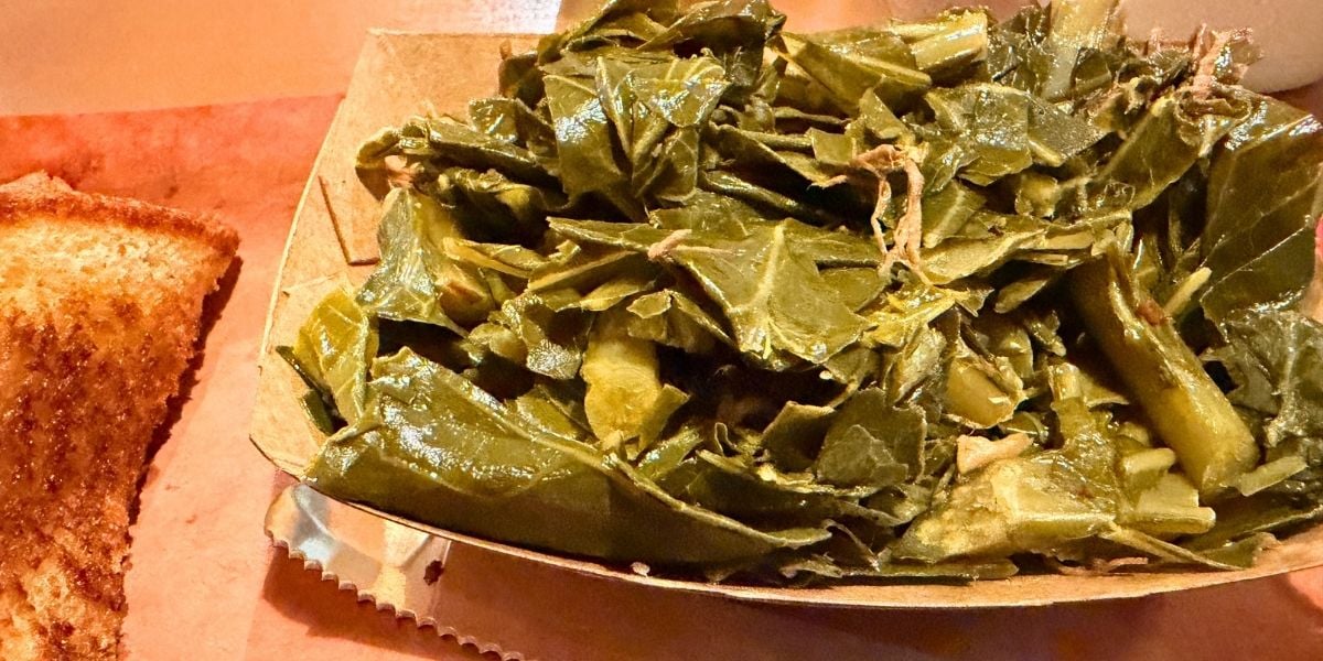 Side of seasoned collard greens served at Haywood Smokehouse in Waynesville