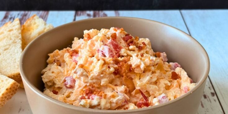 Smoked Gouda pimento cheese with bacon served with toasted bread.