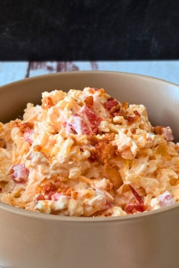 Smoked Gouda pimento cheese with bacon served with toasted bread.
