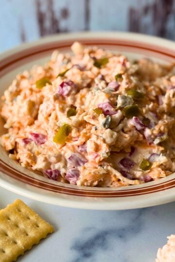 Homemade jalapeño pimento cheese with crackers.